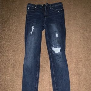 dark wash distressed jeans